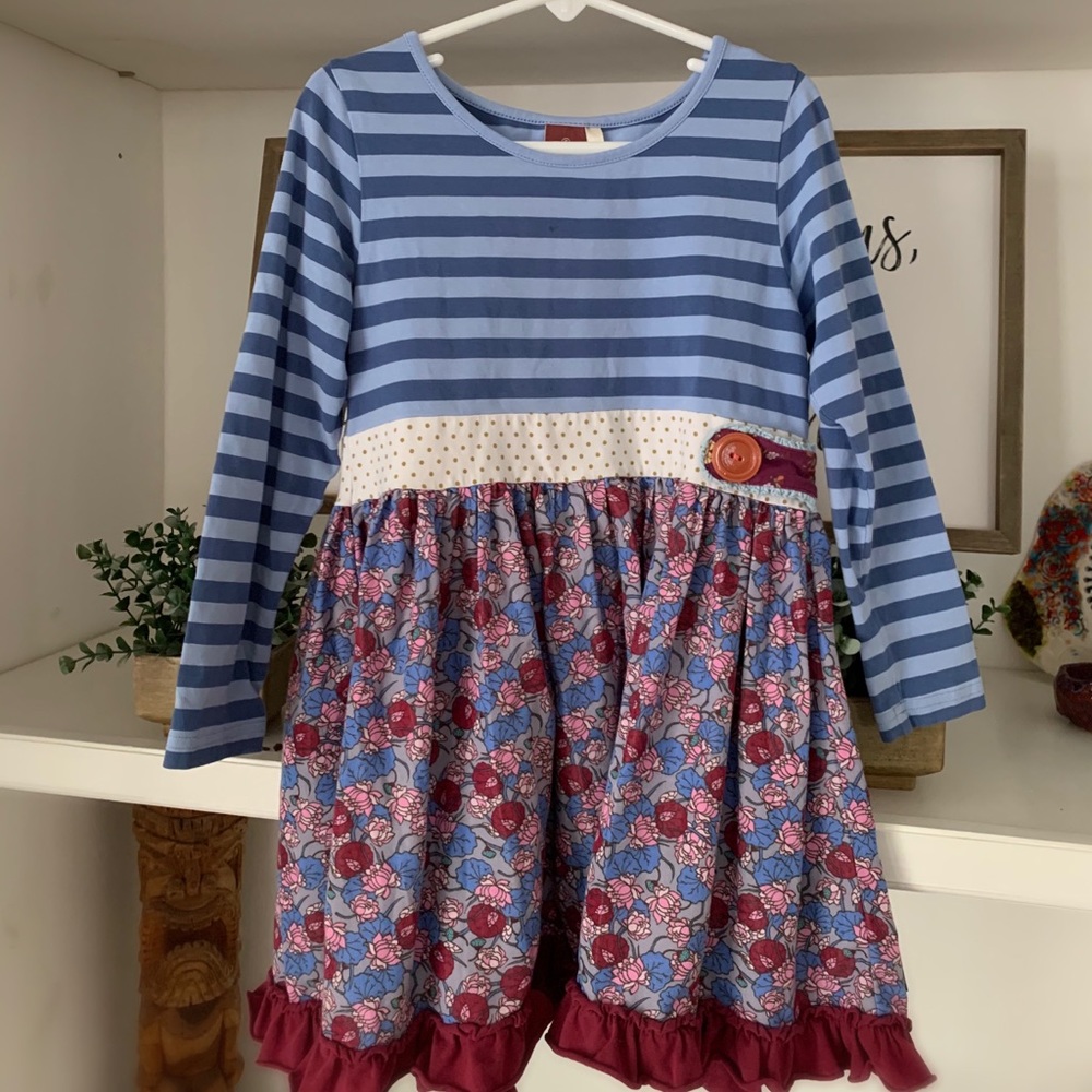 A cute striped and patterned shirt.